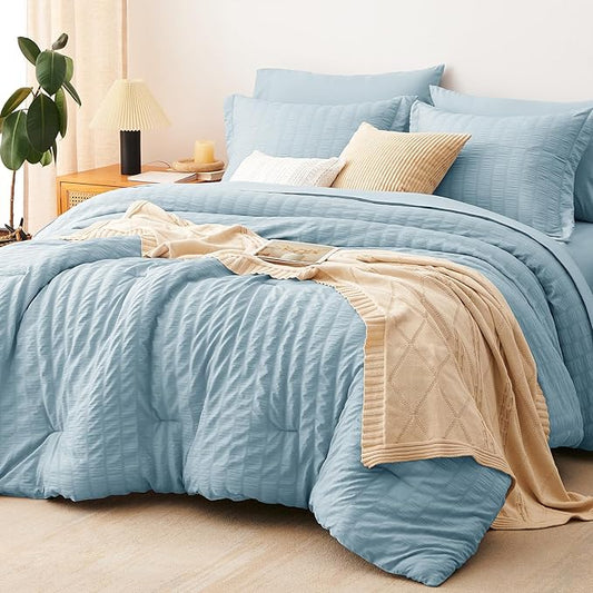 CozyLux Oversized King Comforter Set Light Blue Seersucker 7 Pieces 120x98 Bed in a Bag Comforter Set with Sheets, Luxury Soft Bedding Sets with Down Alternative Comforter, Sheets, Pillowcases & Shams