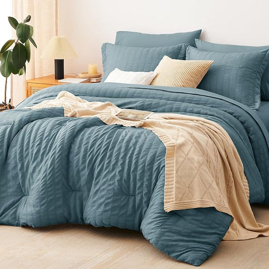 CozyLux Oversized King Comforter Set Mineral Blue Seersucker 7 Pieces 120x98 Bed in a Bag Comforter Set with Sheets, Luxury Bedding Sets with Down Alternative Comforter, Sheets, Pillowcases & Shams